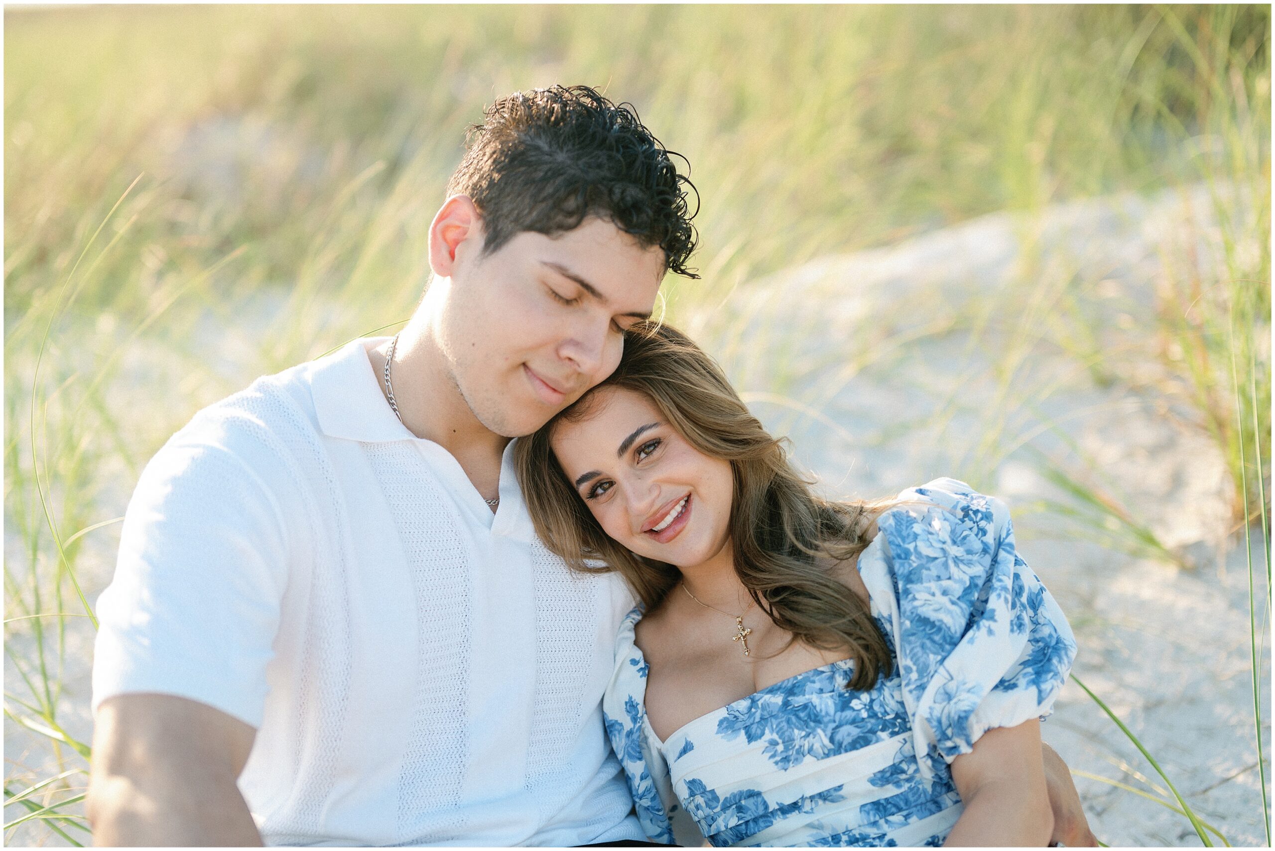 Reasons to have engagement session on the beach snuggled on the sand 