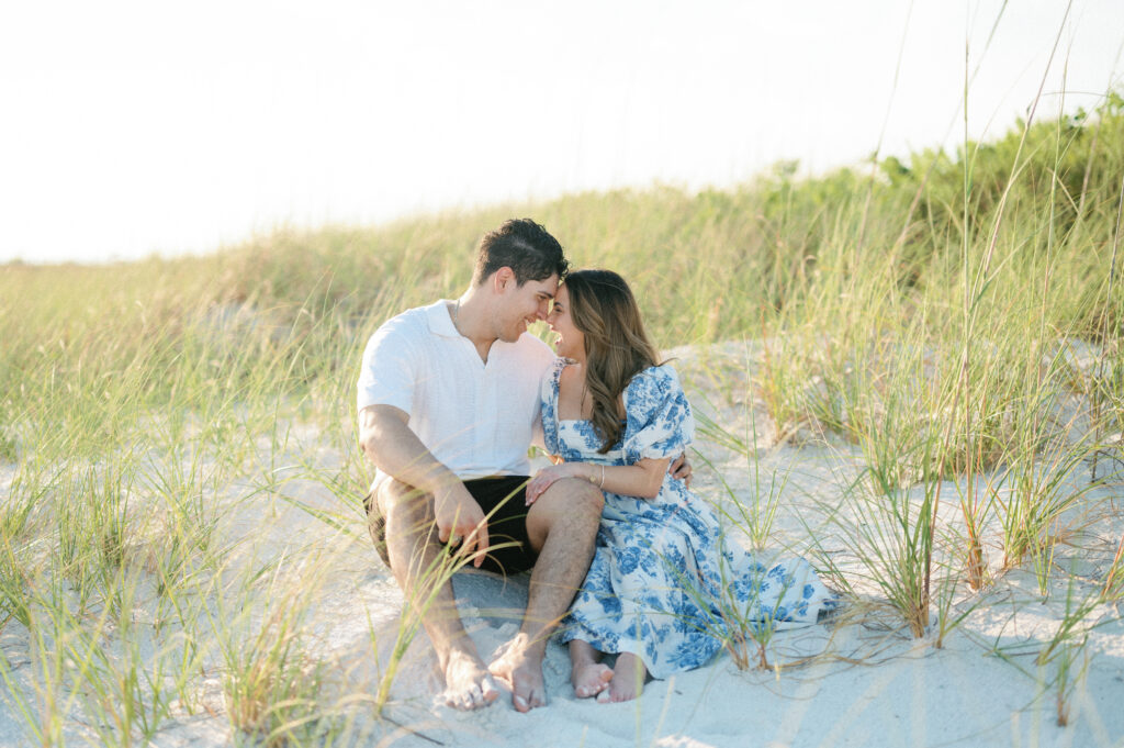 Couple Laughing on the Beach - reasons to have engagement session 