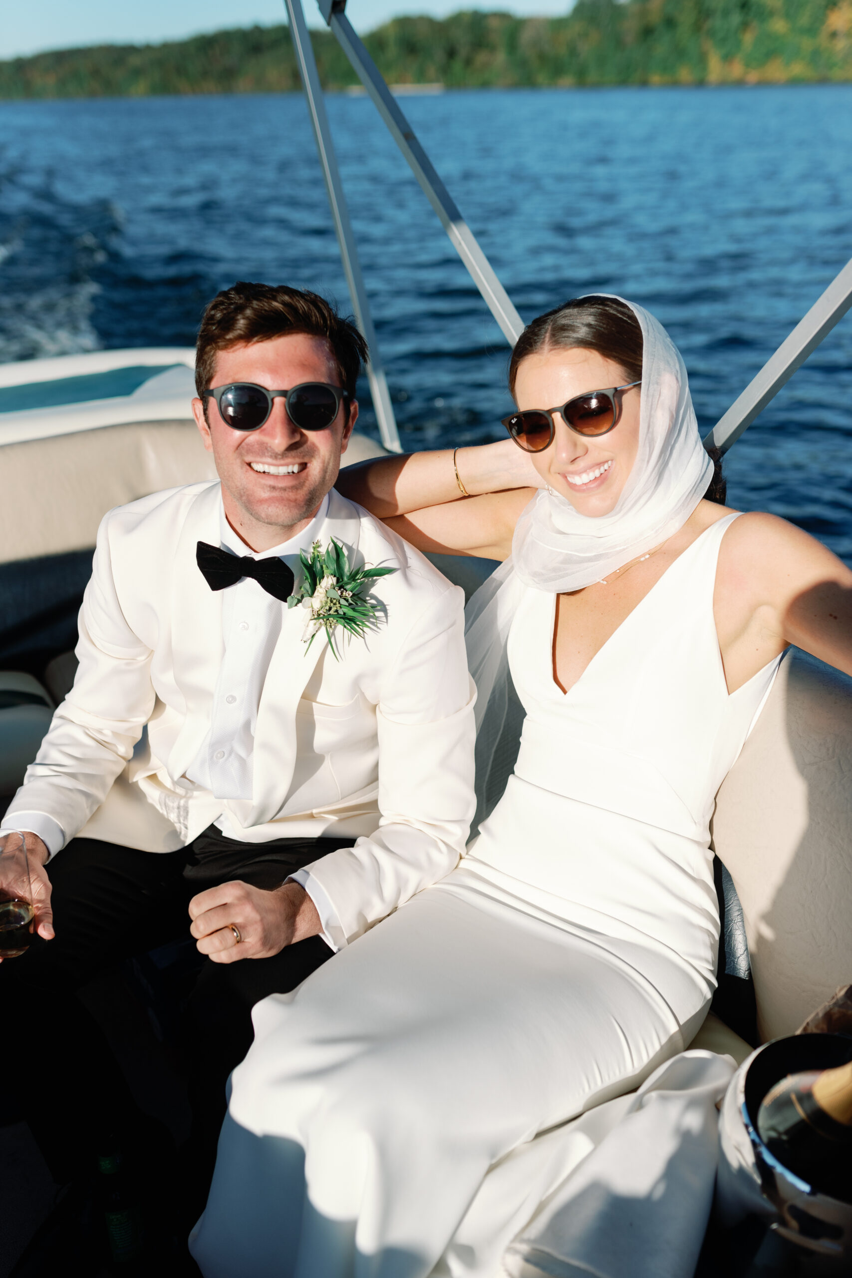 Boat portrait of the bride and groom at their micro wedding