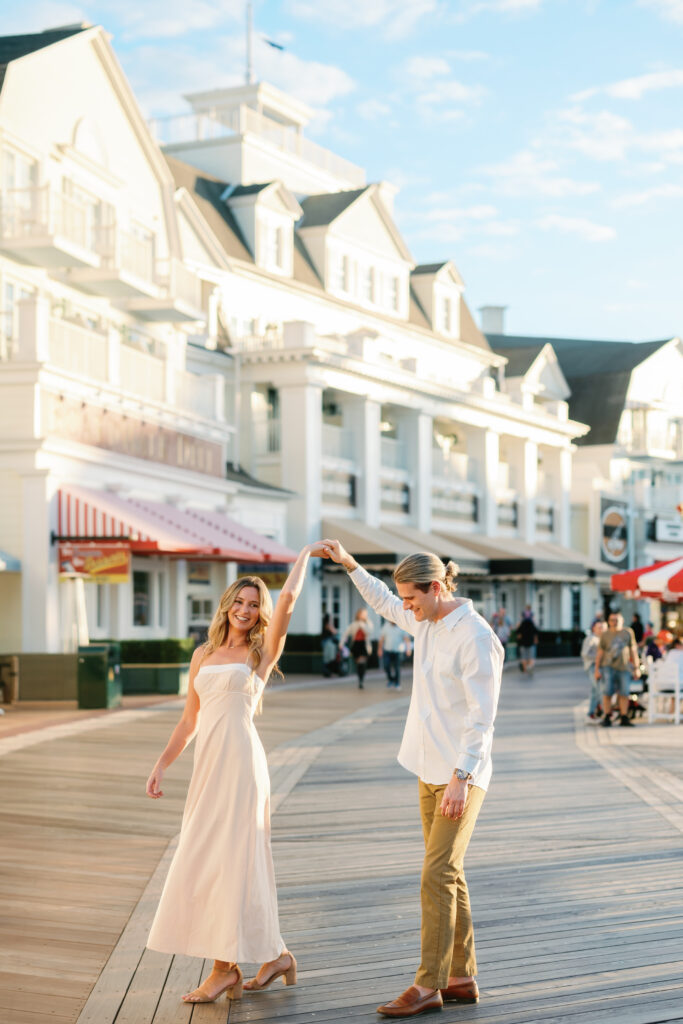 Engagement Session - Happy Twirl - Disney Boardwalk - Alaina René Photography