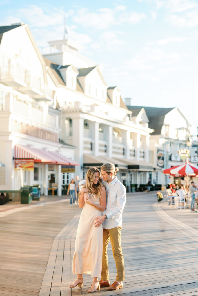 Couple embracing - Disney Boardwalk - Orlando Florida - Alaina René Photography