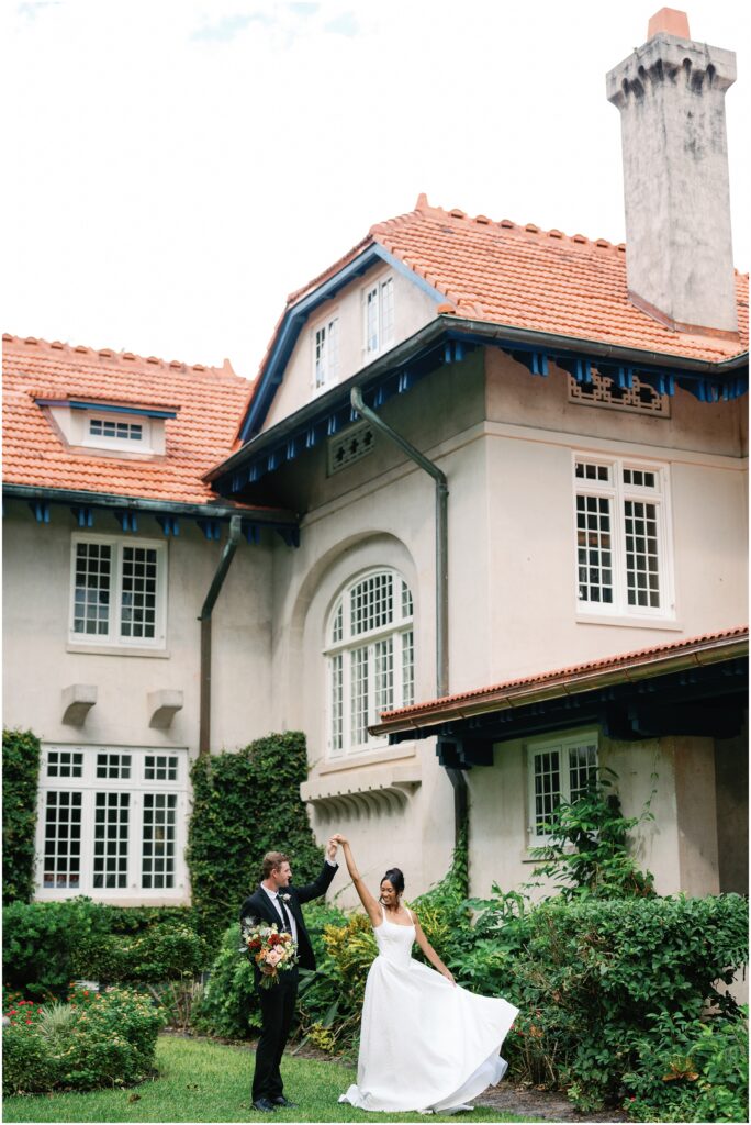 Bride and Groom Twirling together at Sydonie Mansion in Orlando Florida